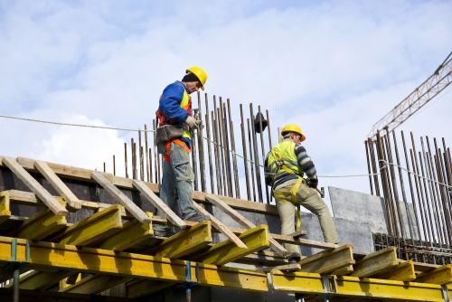 workers-examining-work